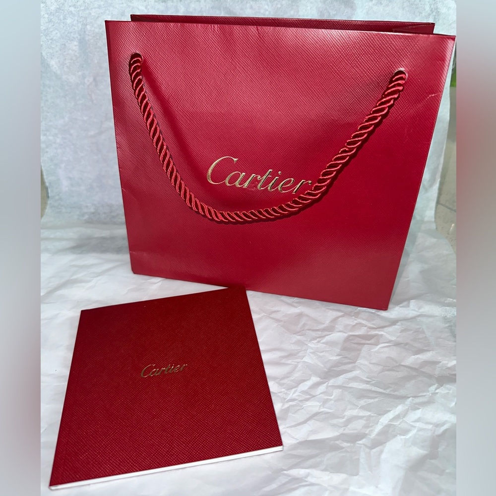 Cartier gift bag and love book